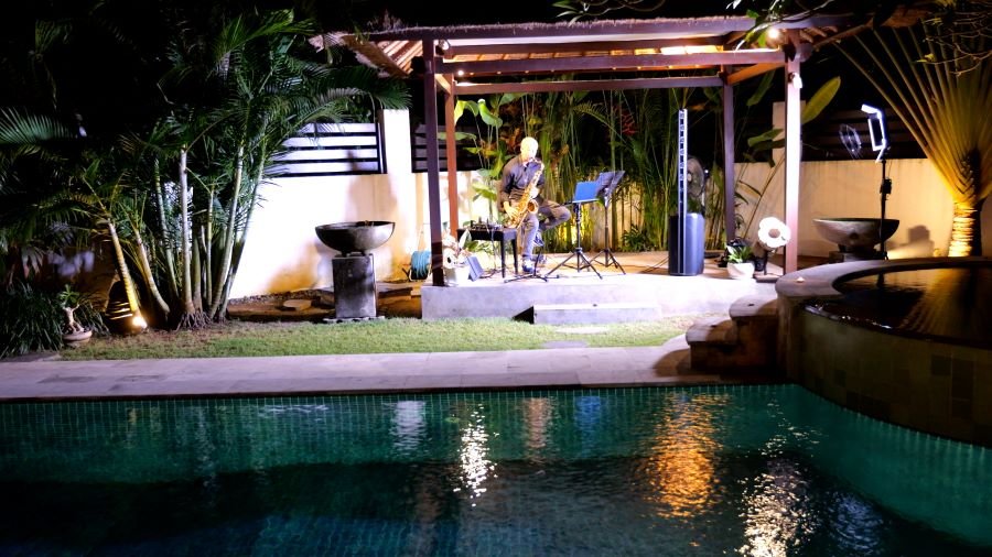 Saxophonist playing jazz in a private villa in Bali