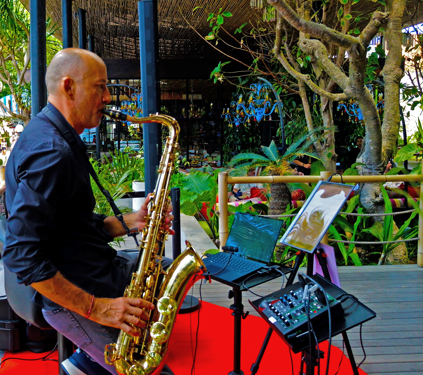 Saxophonist playing jazz in a refined hotel in Bali