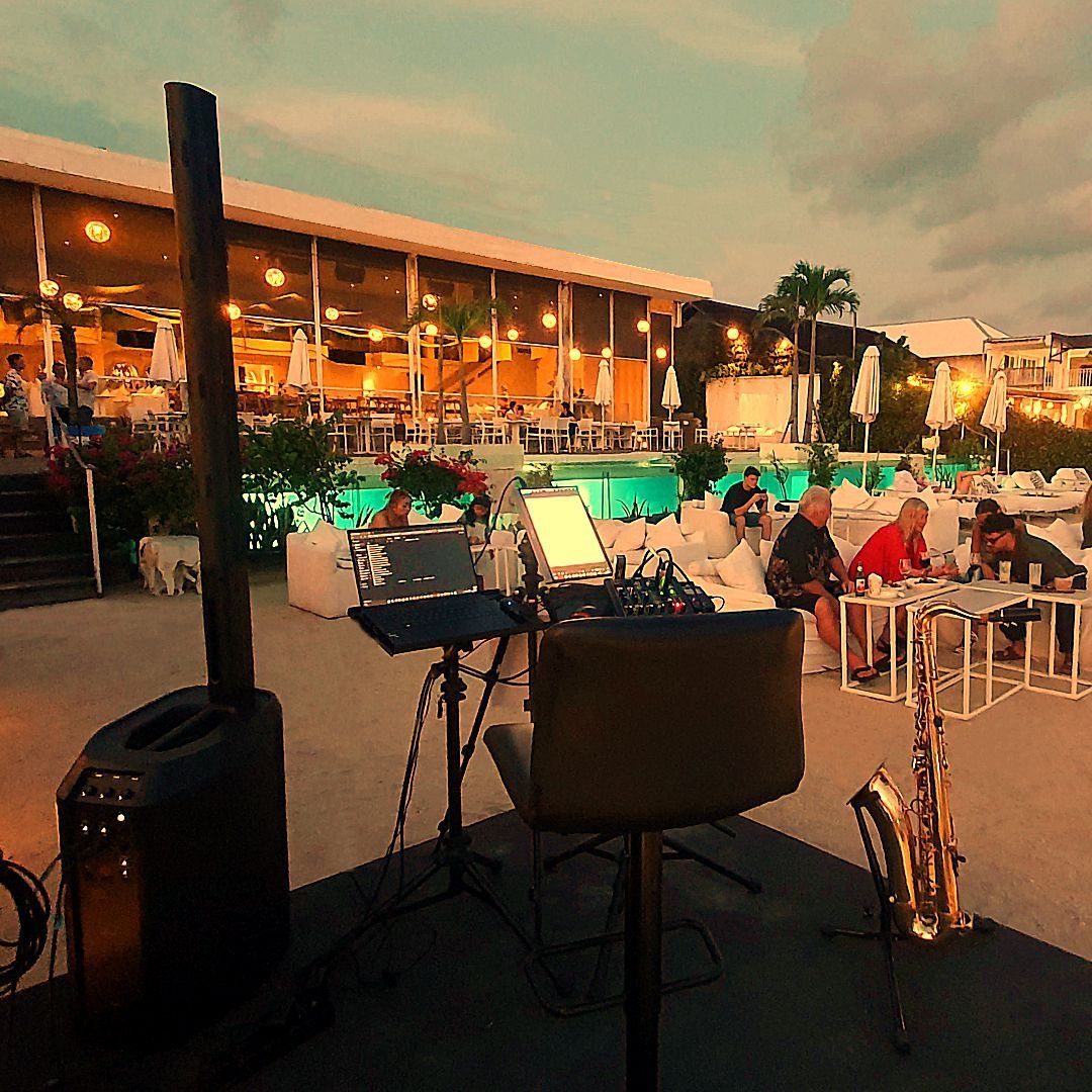 Saxophonist playing smooth jazz in a luxury restaurant in Bali