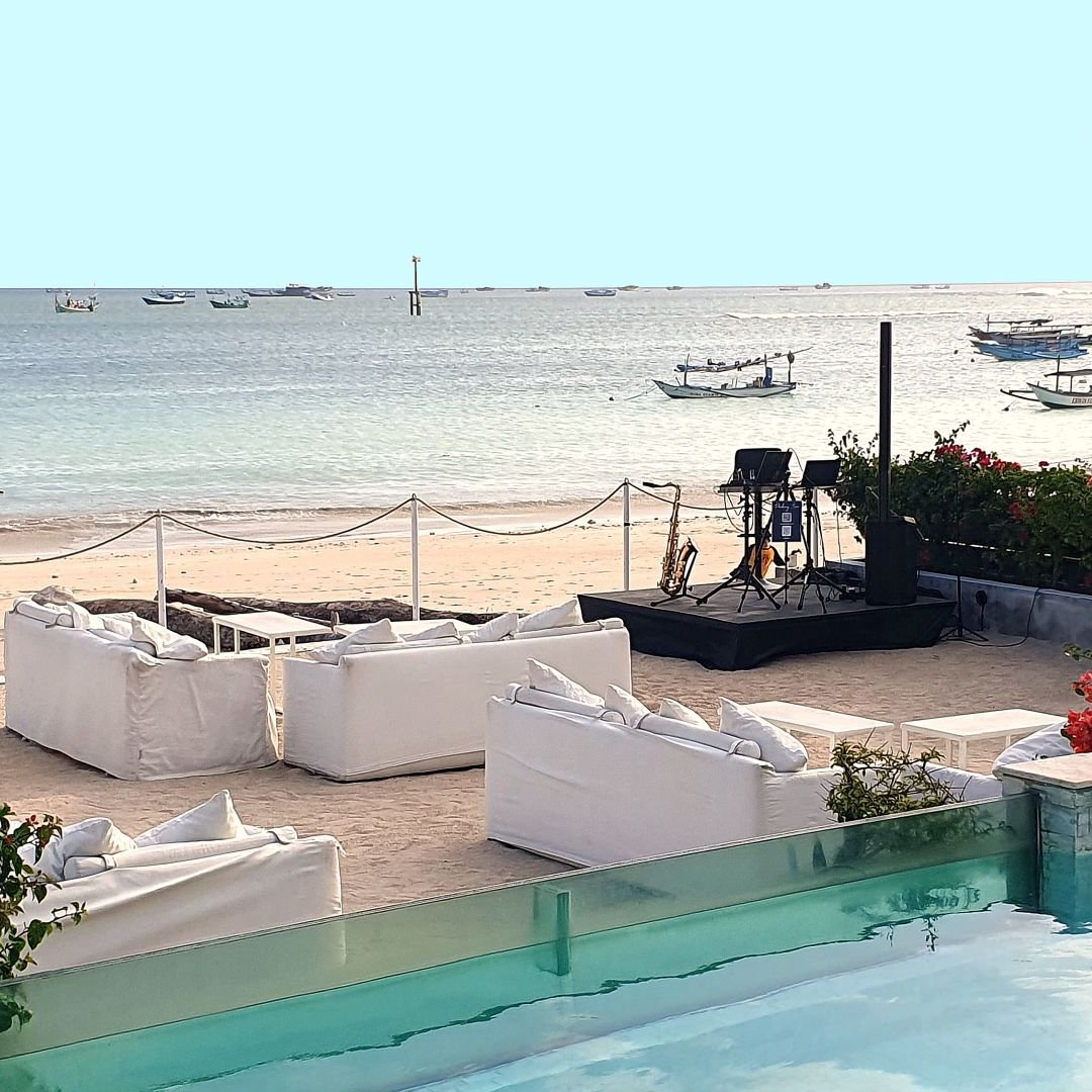 Romantic saxophone performance at a Bali beach restaurant