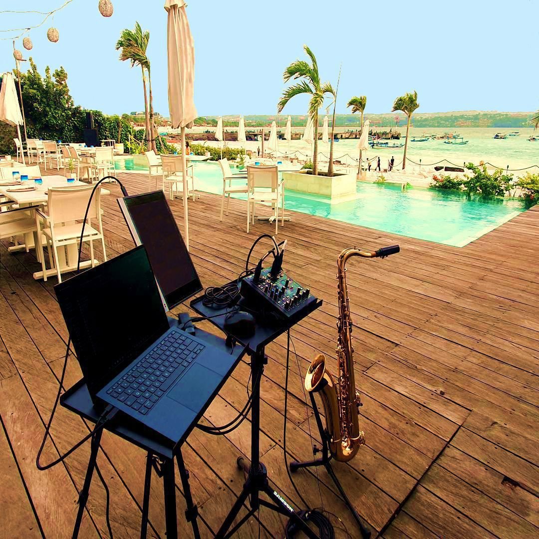 Fine dining venue saxophonist with Padany Sax, live music for a beach restaurant in Bali