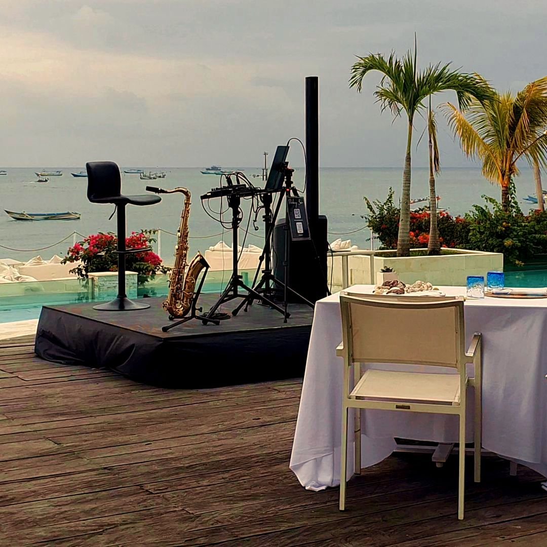 Professional saxophonist performing live for beach restaurant in Bali