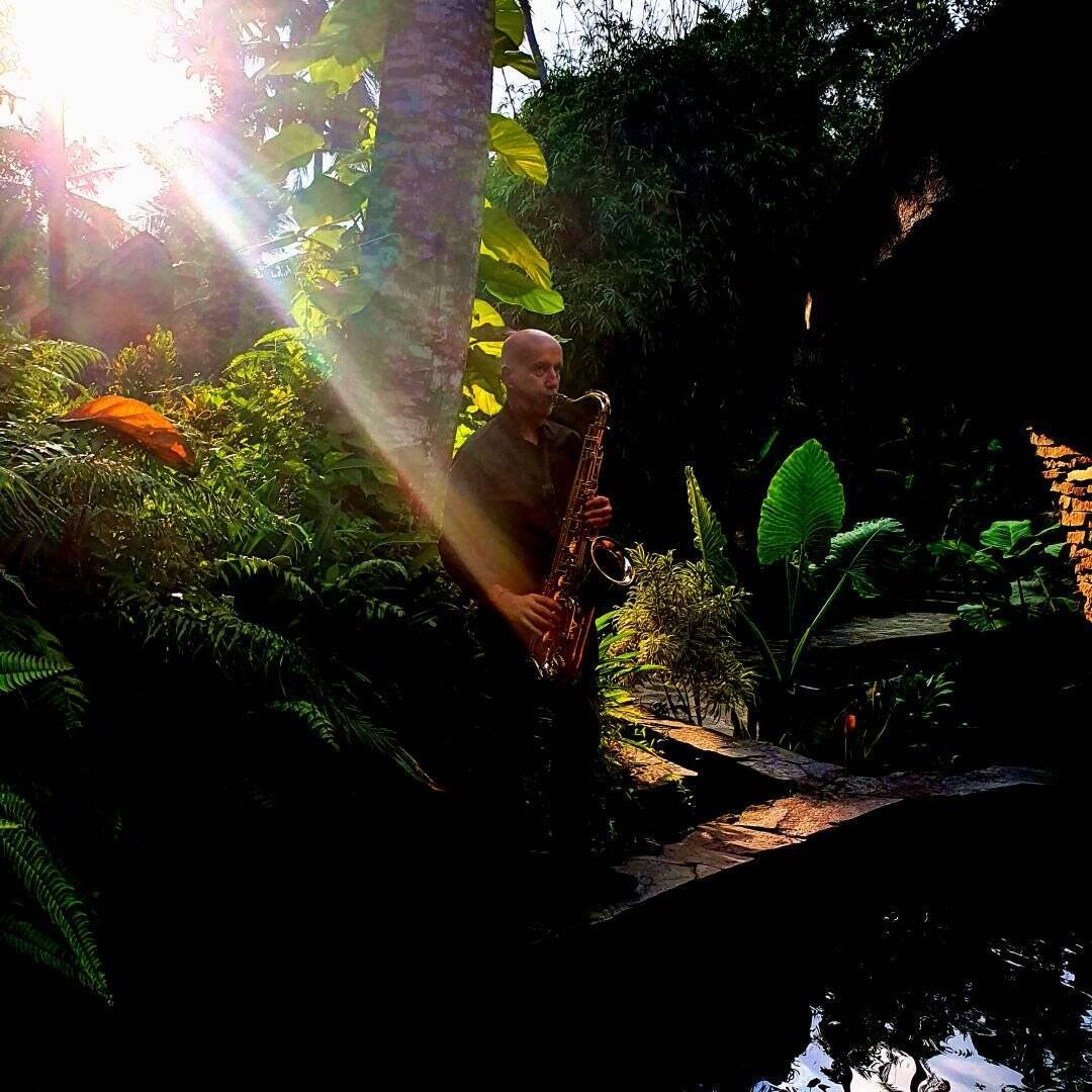 Saxophonist creating a romantic atmosphere for luxury resort in Bali