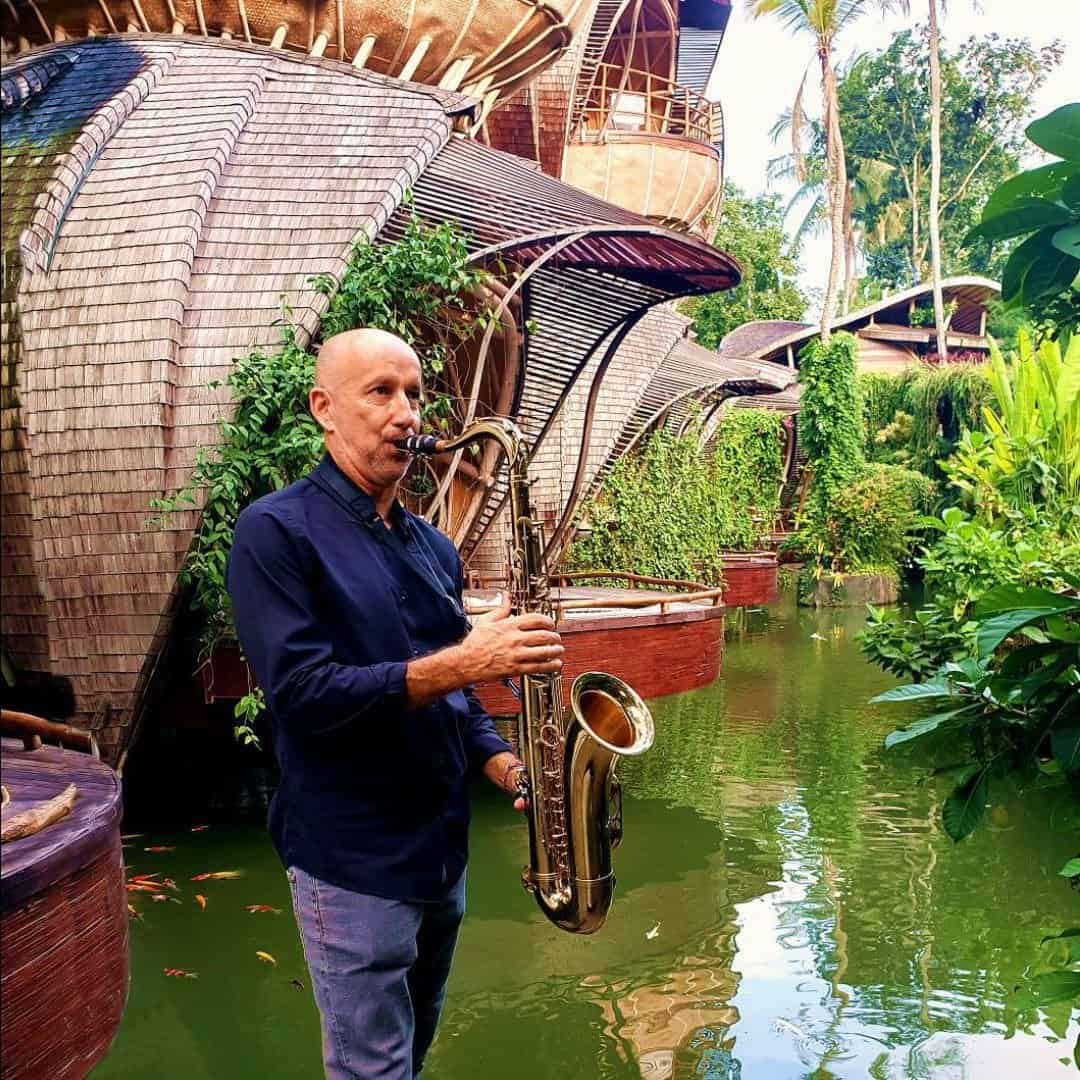 Saxophonist playing smooth jazz in a luxury resort in Bali