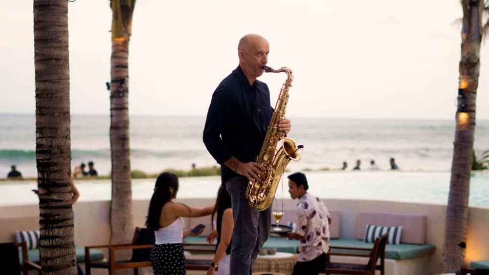 Professional saxophonist playing modern jazz in a lounge bar
