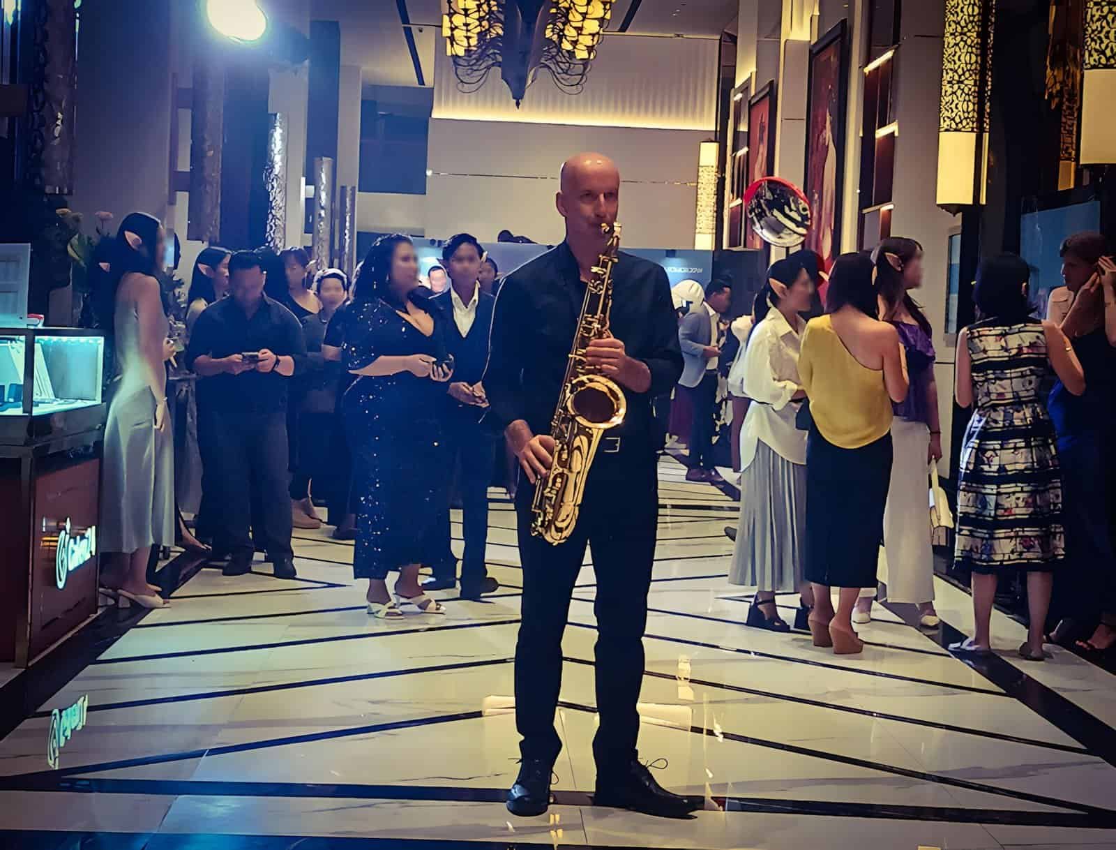 Professional saxophonist performing live during Phenom Event Indonesia's 20th Anniversary Celebration at InterContinental Bali Sanur Resort