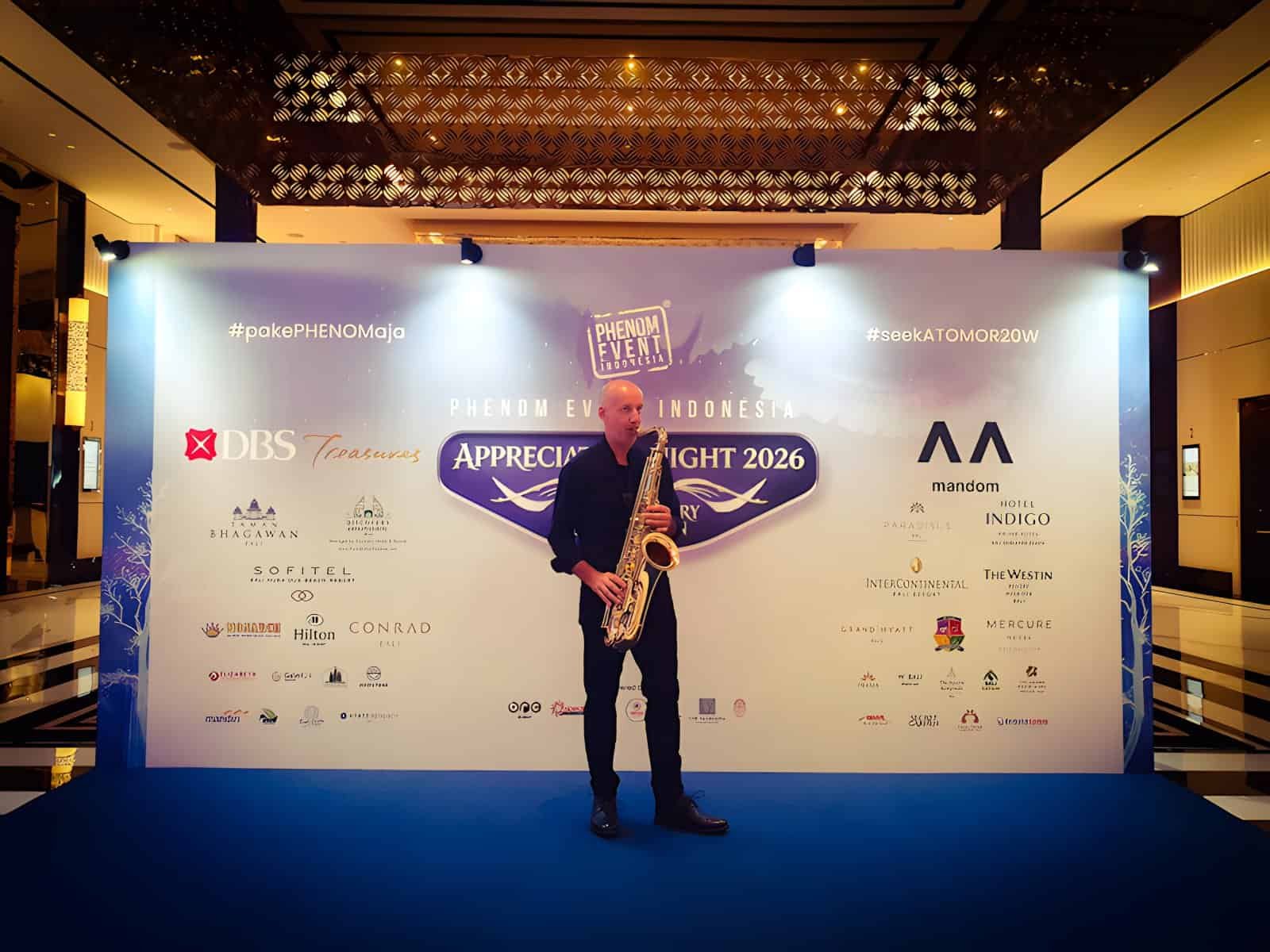 Professional saxophonist performing live at Phenom Event Indonesia's 20th Anniversary Celebration at InterContinental Bali Sanur Resort